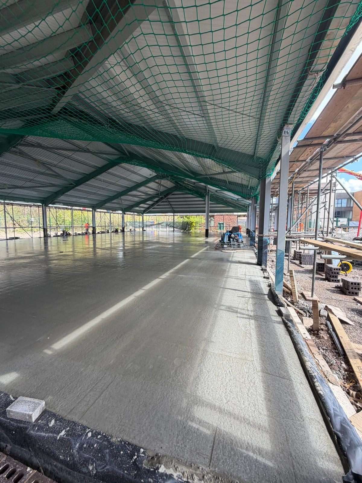 New floor slab beneath an open sided canopy